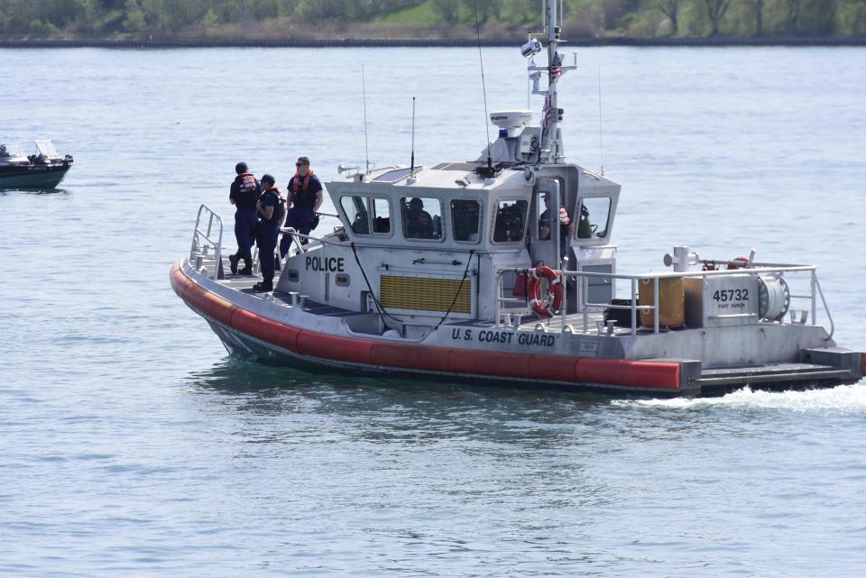 Rescue crews respond to a pickup truck found in the St. Clair River on the 3200 block of Military Street in Port Huron on Thursday, May 12, 2022.