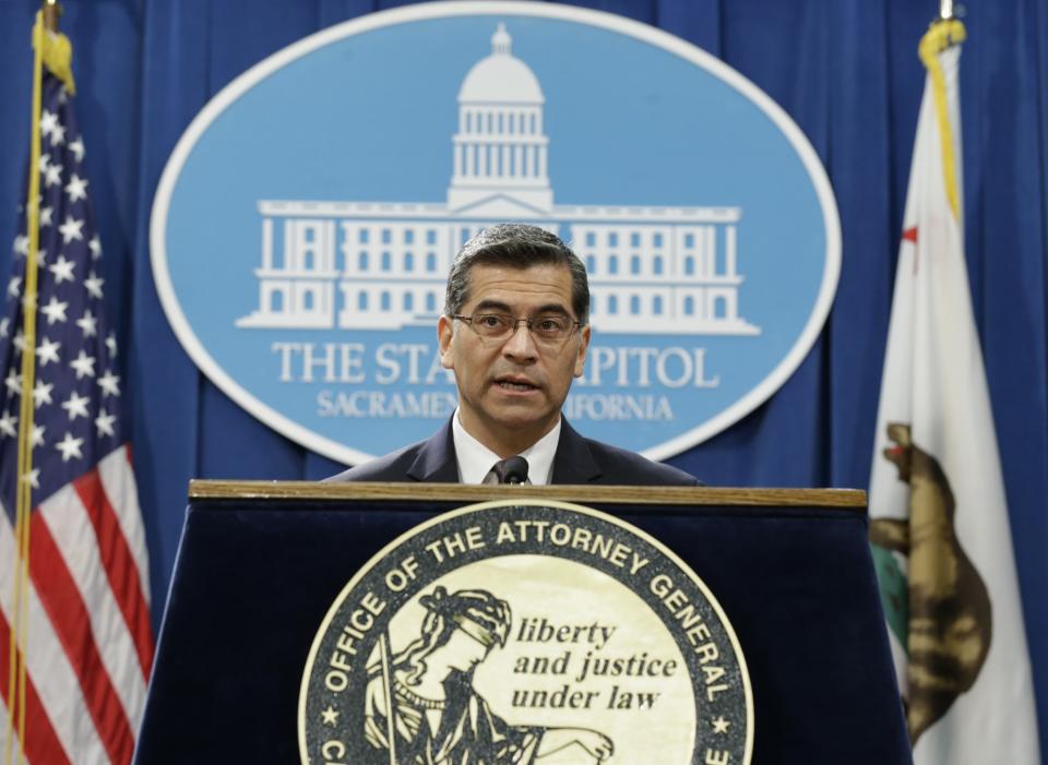 Xavier Becerra, California’s new attorney general, talks to reporters in Sacramento in January. (Photo: Rich Pedroncelli/AP)