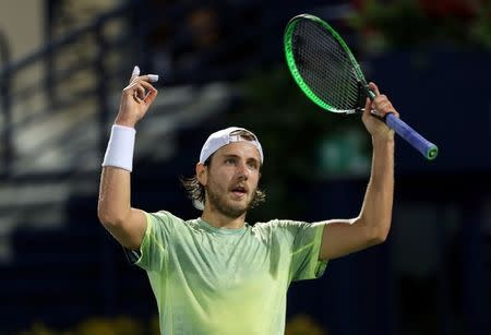 Tennis - ATP - Dubai Open - Semifinal - Dubai, United Arab Emirates - March 2, 2018. Lucas Pouille of France celebrates after defeating Filip Krajinovic of Serbia. REUTERS/Satish Kumar