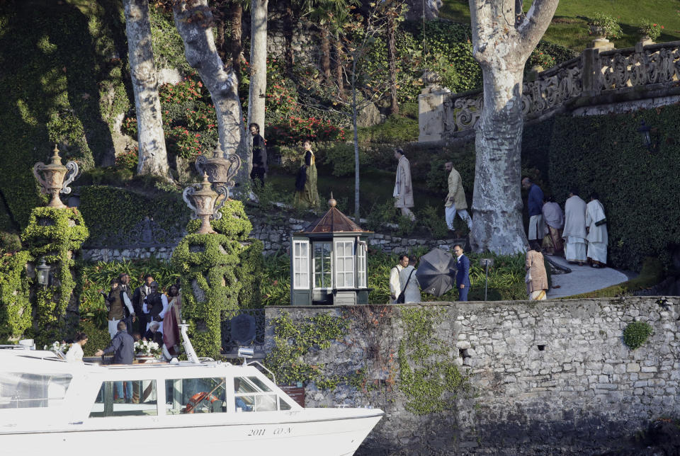 Guests arrive to attend the wedding of Indian Bollywood stars Deepika Padukone and Ranveer Singh at the Villa Balbianello in Lenno, Como lake, northern Italy, Wednesday, Nov. 14, 2018. Wednesday’s nuptials at Villa Balbianello, a lakeside mansion featured in Star Wars and James Bond films, came on the fifth anniversary of the release of their first movie together. (AP Photo/Luca Bruno)