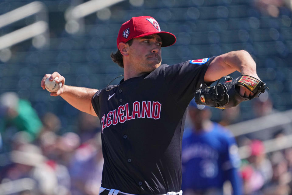 Mar 2, 2024; Goodyear, Arizona, USA; Cleveland Guardians starting pitcher Shane Bieber (57) pitches against the Kansas City Royals during the first inning at Goodyear Ballpark. Mandatory Credit: Joe Camporeale-USA TODAY Sports