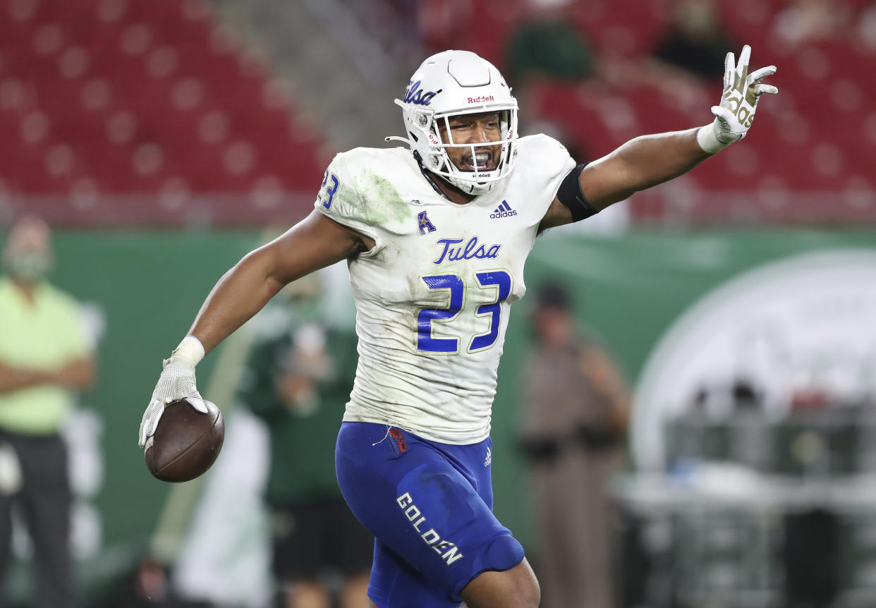 Tulsa linebacker Zaven Collins was one of college football's best defenders in 2020. (AP Photo/Mark LoMoglio, File)