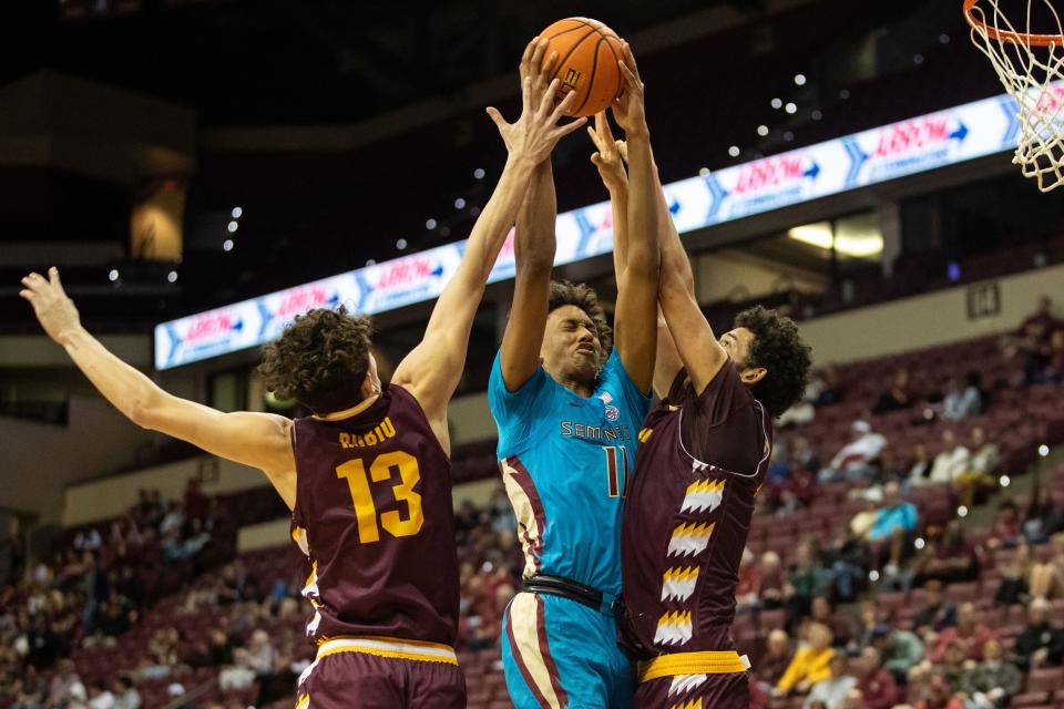 Florida State Seminoles forward Baba Miller (11) shoots from inside the paint. The Florida State Seminoles hosted the Central Michigan Chippewas on Monday, Nov. 13, 2023.