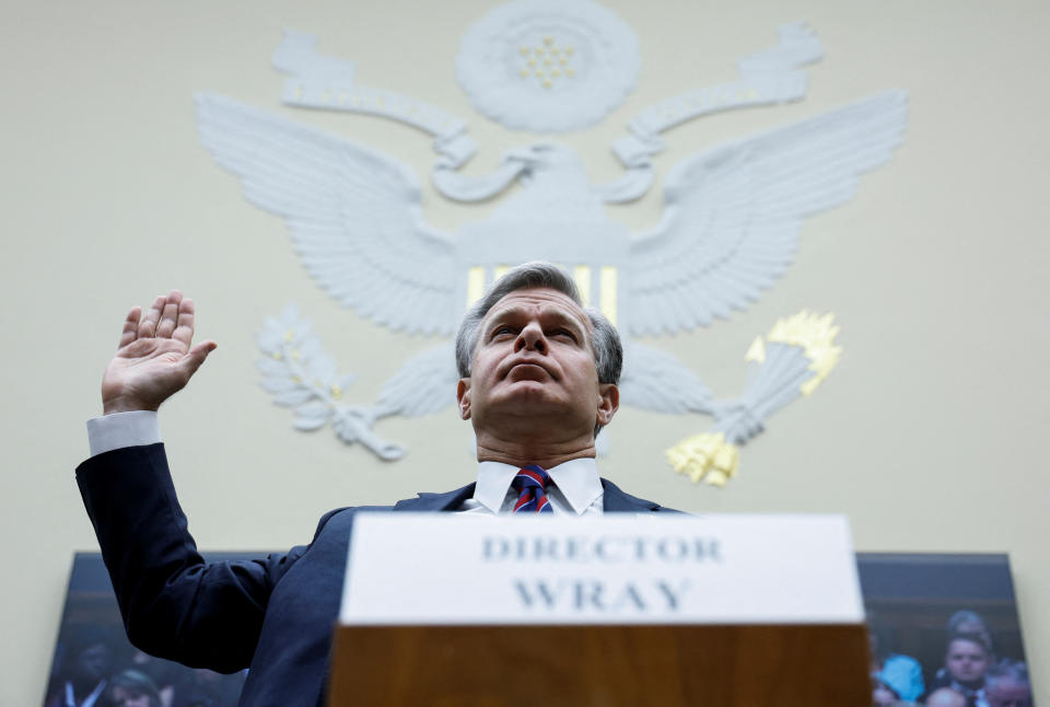 Christopher Wray is sworn in prior to testifying before a House Judiciary Committee hearing. 