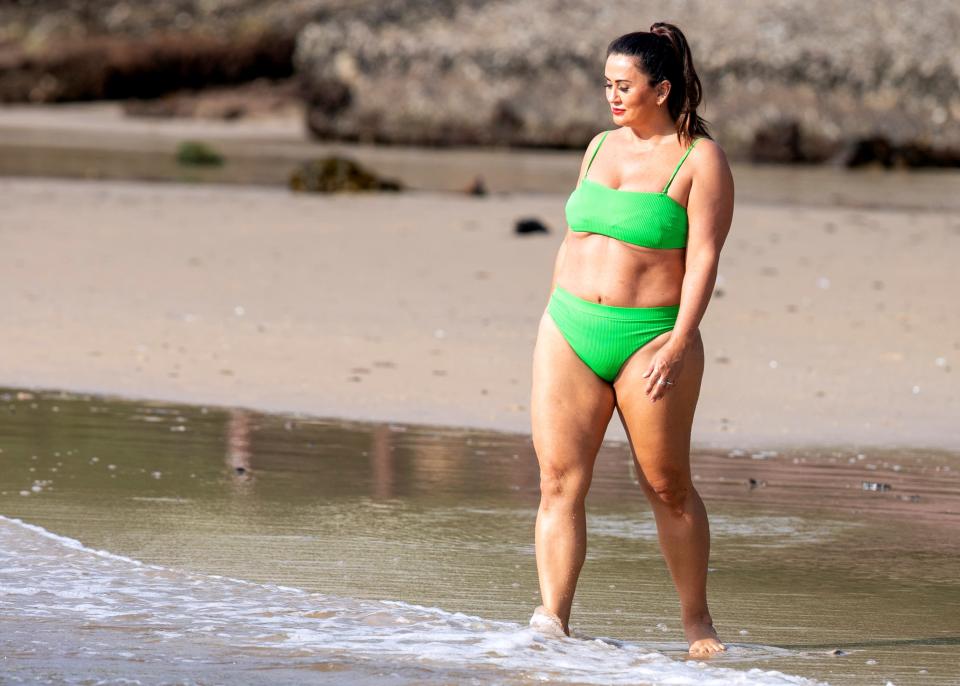 MAFS bride Mishel Meshes cools off in the Sydney heat by taking a dip in a lime green bikini. Photo: DIIMEX.