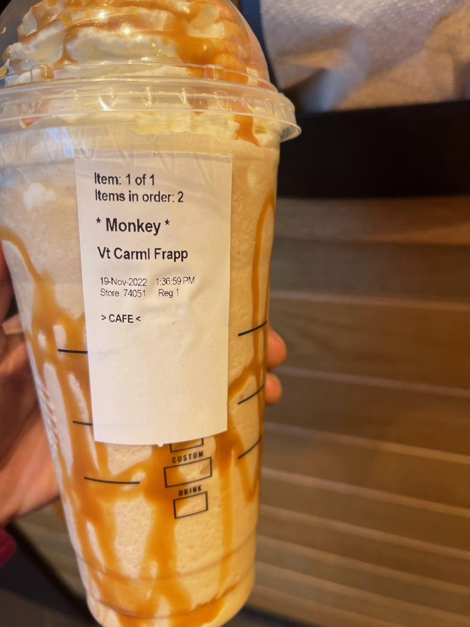 Starbucks cup, labelled with the word 'Monkey.' (Monique Pugh)