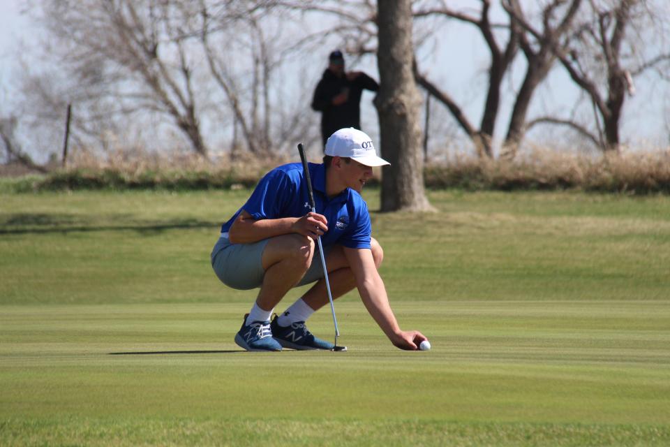 Perry's Kain Killmer lines up his shot during an invitational on Thursday, April 13, 2023, at Woodward Golf Club.