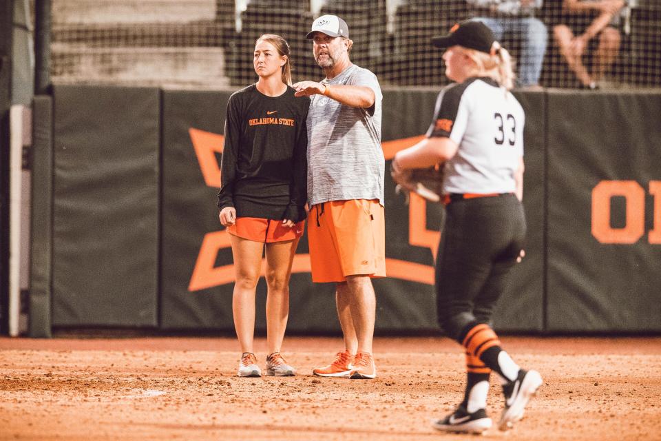 Oklahoma State assistant softball coach Vanessa Shippy-Fletcher, left, was promoted to hitting coach in December by head coach Kenny Gajewski.