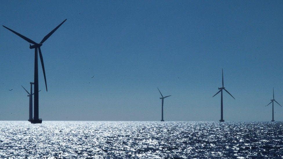 Five wind turbines in an offshore wind farm