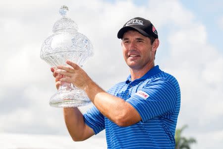 Mar 2, 2015; Palm Beach Gardens, FL, USA; Padraig Harrington celebrates winning the Honda Classic at PGA National GC Champion Course. Peter Casey-USA TODAY Sports