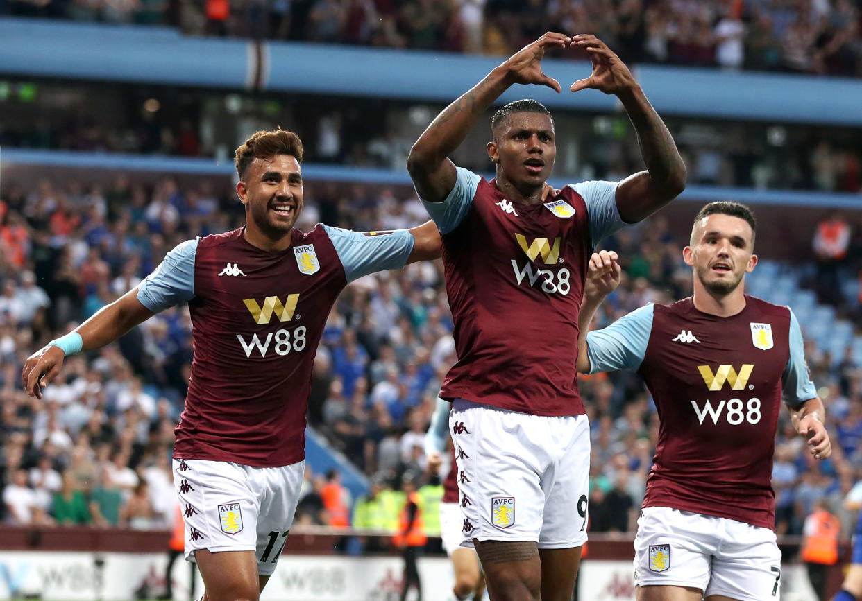 Aston Villa's Wesley (centre) celebrates scoring his side's first goal of the game with Trezeguet (left) and John McGinn during the Premier League match at Villa Park, Birmingham. (Photo by Nick Potts/PA Images via Getty Images)