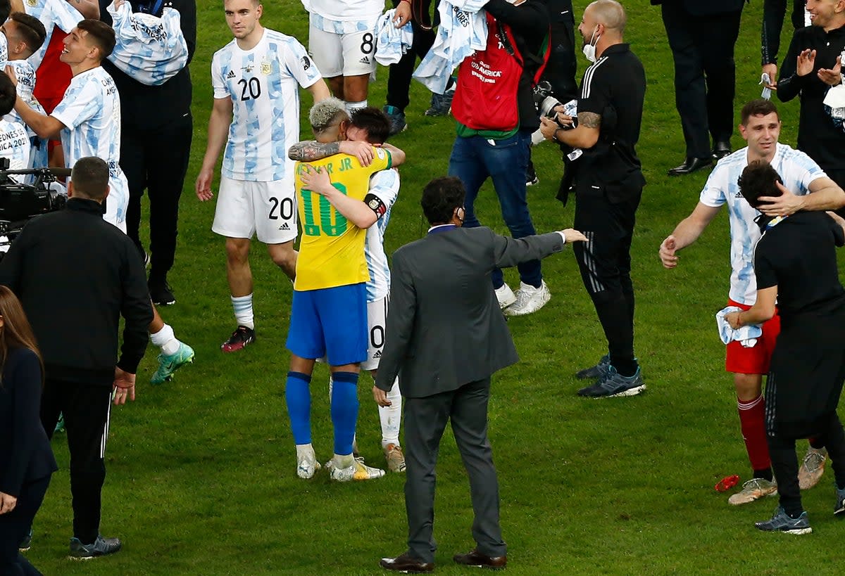 Neymar and Lionel Messi embrace at the end of the 2021 Copa America final (Getty Images)