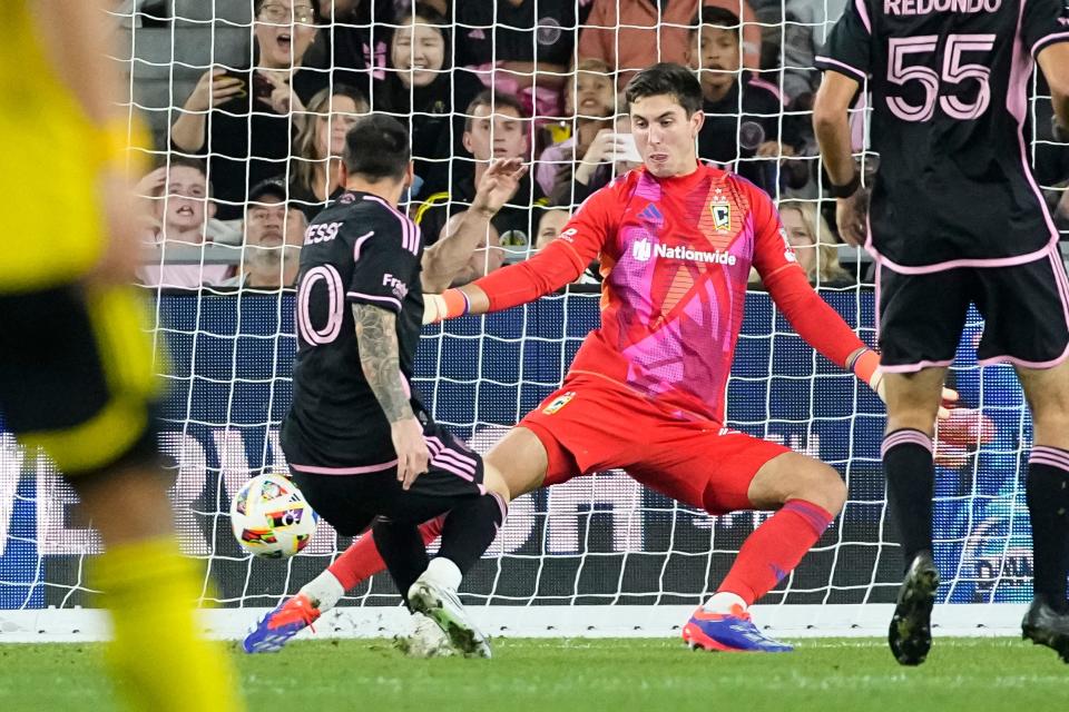 Oct 2, 2024; Columbus, OH, USA; Inter Miami CF forward Lionel Messi (10) scores past Columbus Crew goalkeeper Patrick Schulte (28) during the first half of the MLS soccer game at Lower.com Field.