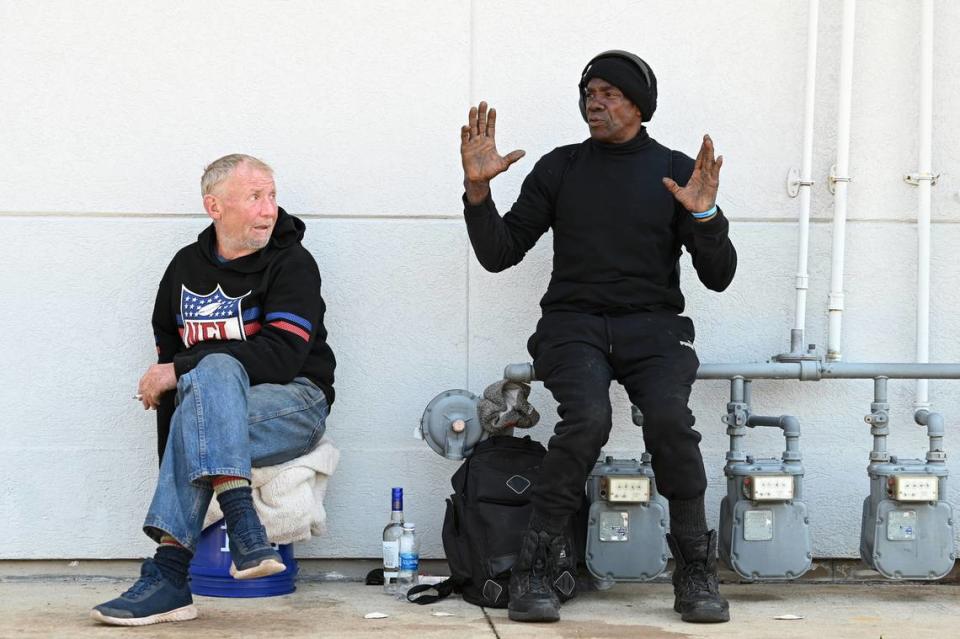 Kenny, at right, and Lefty are two homeless Charlotte men whose entire lives have revolved around standing on a median and asking strangers for money.