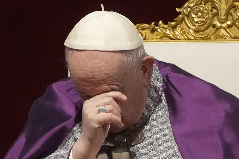 Pope Francis gestures as he presides over a special prayer in St. Peter's Basilica at the Vatican, Friday, March 25, 2022. Francis is presiding over a special prayer for Ukraine that harks back to a century-old apocalyptic prophesy about peace and Russia that was sparked by purported visions of the Virgin Mary to three peasant children in Fatima, Portugal in 1917. (AP Photo/Gregorio Borgia)