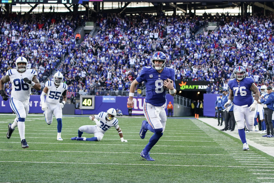 New York Giants' Daniel Jones (8) runs for a touchdown during the second half of an NFL football game against the Indianapolis Colts, Sunday, Jan. 1, 2023, in East Rutherford, N.J. (AP Photo/Bryan Woolston)