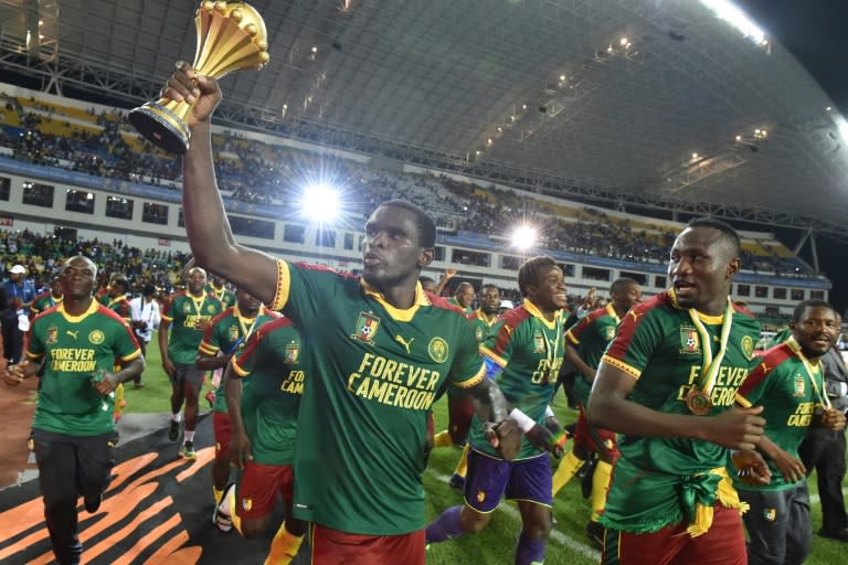 Cameroon's players celebrate beating Egypt 2-1 to win the 2017 Africa Cup of Nations in Libreville on February 5, 2017