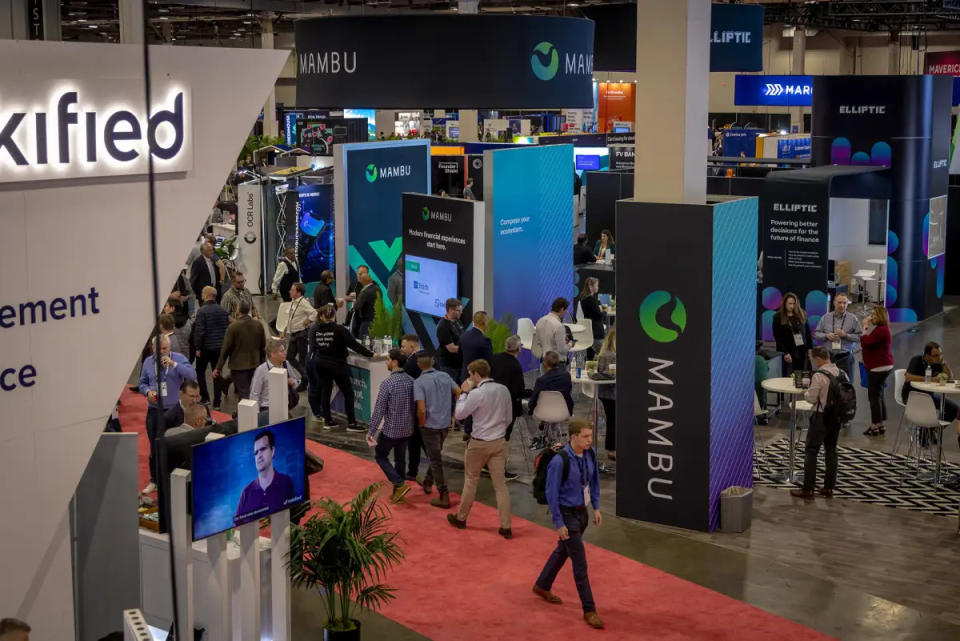 Money 20/20 conference attendees walk through The Venetian Expo Hall in Las Vegas, October 24, 2022 (Photo credit: Money 20/20)