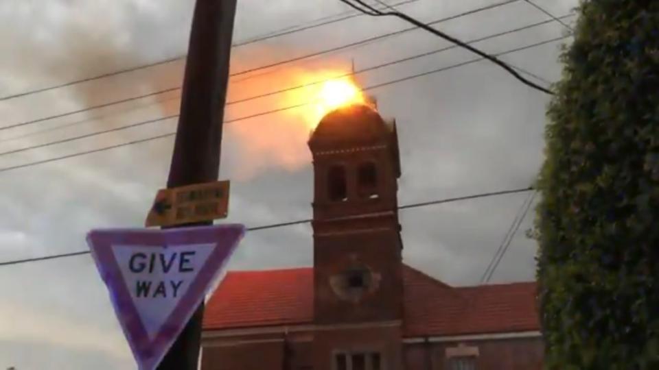 <p>The bell tower ablaze in Sydney’s Inner West</p> (Screengrab/Twitter)