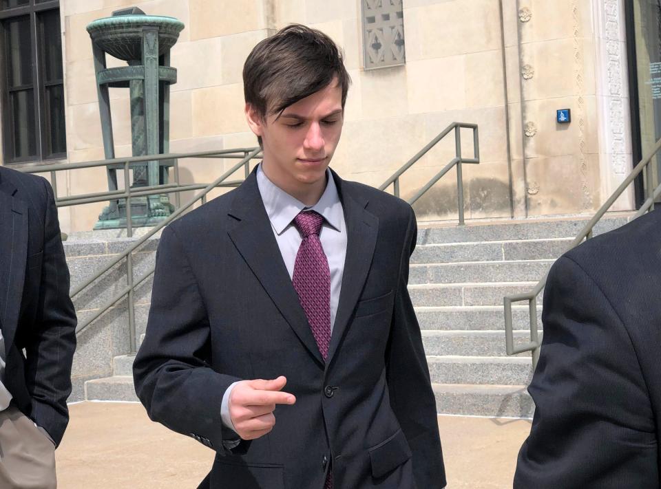 In this April 3, 2019, file photo, Casey Viner, an Ohio gamer accused of recruiting a prankster to make a bogus emergency call, leaves federal court in Wichita, Kan., after changing his plea to guilty for his alleged part in the hoax that got an unarmed Kansas man killed by police.