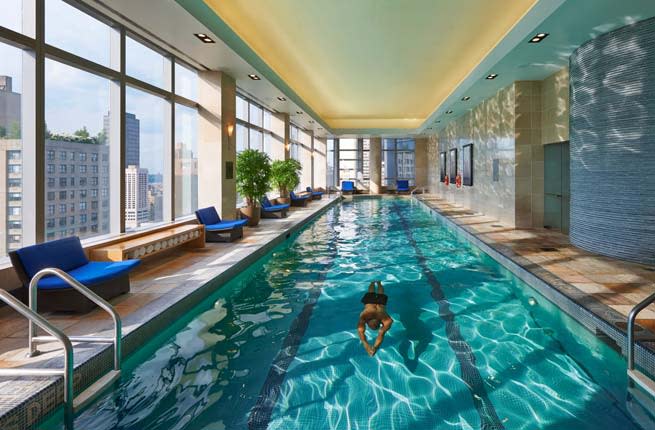 <p><strong>Where: </strong>New York City</p> <p>One of the city’s best rooftop shorelines is at the well-heeled . Views from the 36th, where the sunlit indoor 75-foot pool is, are of the Hudson River. Despite the ‘I heart NYC’ panoramic, there’s a peace and tranquility in the air that is more Bali-esque. To access these classy Midtown waters, you must buy a full-day at the spa. The weekday $1,320 price tag includes a variety of head-to-toe treatments, a bento box lunch, and various heat experiences. It also includes access to the fitness center and Oriental Tea Lounge.</p> <p><strong>Insider Tip:</strong> Try the Experience shower. Different colors and pressures simulate a tropical rain.</p> <p><strong>Plan Your Trip: </strong>Visit </p>