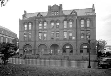 Willis, Alfred, 1880-1945 - Built on Magnolia Street in the late 1880s, this structure was known as the Cleveland Building. Jesse and John Cleveland had businesses here. Many law offices were located in what became known as the Cleveland Law Range.