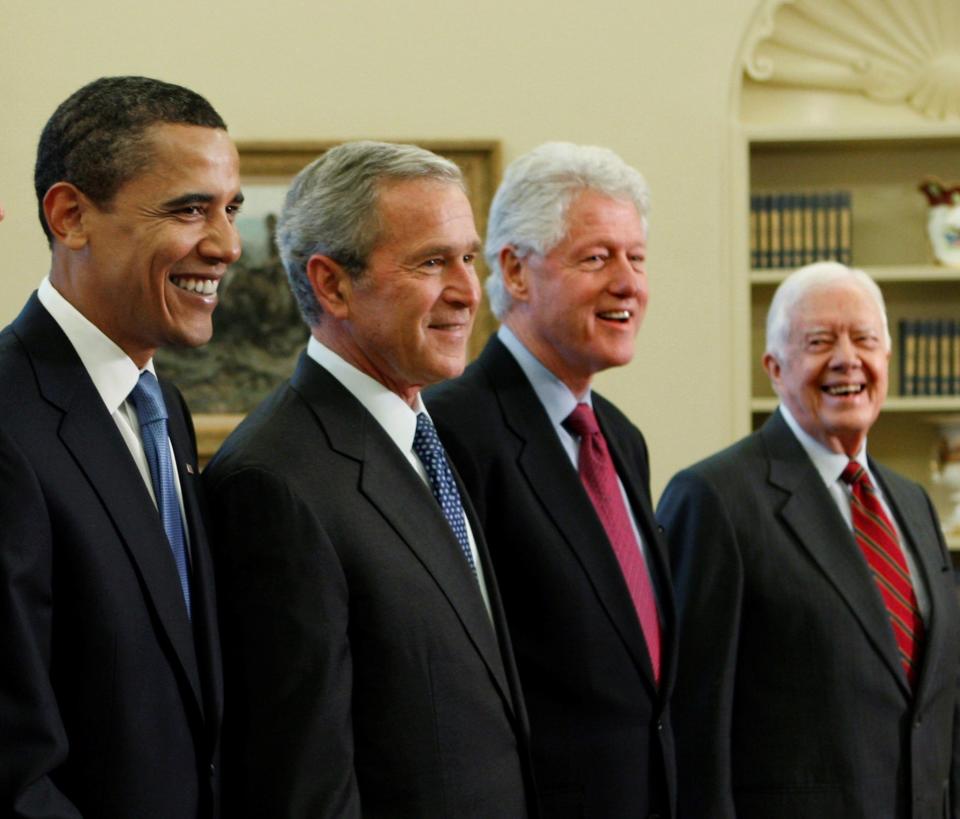 Former Presidents Barack Obama, George W. Bush, Bill Clinton, and Jimmy Carter on January 7, 2009, in the Oval Office of the White House in Washington.