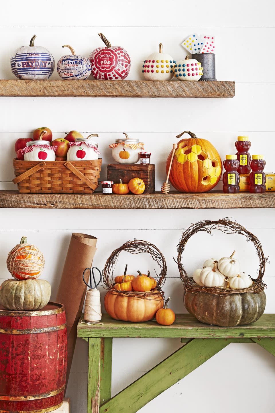 <p>Fill these cutie pumpkin baskets with mini pumpkins or candy for kiddos.<br></p><p>Cut off the top quarter of a flat pumpkin (this is a Musquee de Provence variety); scoop out pulp and seeds. Attach lengths of grapevine just below the opening with T-pins. Attach a grapevine handle just inside the opening with T-pins. Nestle mini pumpkins in the basket. </p>