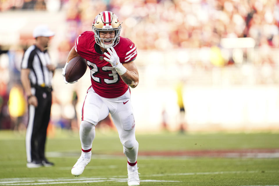 Christian McCaffrey won't miss a game due to his oblique injury. (Photo by Cooper Neill/Getty Images)