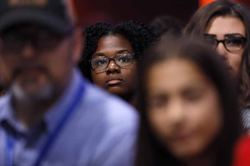 Audience members listen to Democratic presidential candidate Rep. Tim Ryan speak at the Presidential Gun Sense Forum, Saturday, Aug. 10, 2019, in Des Moines, Iowa. (AP Photo/Charlie Neibergall)