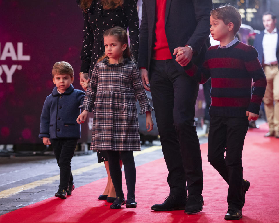 The Duke and Duchess of Cambridge and their children, Prince Louis, Princess Charlotte and Prince George attend a special pantomime performance at London's Palladium Theatre, hosted by The National Lottery, to thank key workers and their families for their efforts throughout the pandemic.