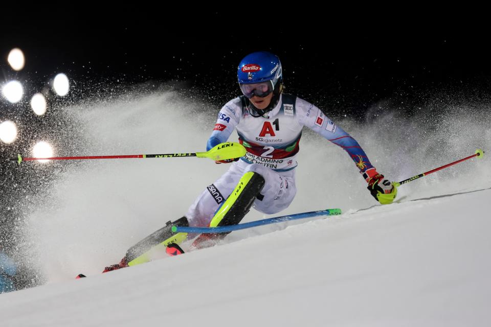 Mikaela Shiffrin speeds down the course during the first run of an alpine ski women's World Cup slalom, in Schladming, Austria, Jan. 11, 2022.