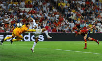 Xabi Alonso of Spain scores the first goal past Hugo Lloris of France during the UEFA EURO 2012 quarter final match between Spain and France at Donbass Arena on June 23, 2012 in Donetsk, Ukraine. (Photo by Laurence Griffiths/Getty Images)