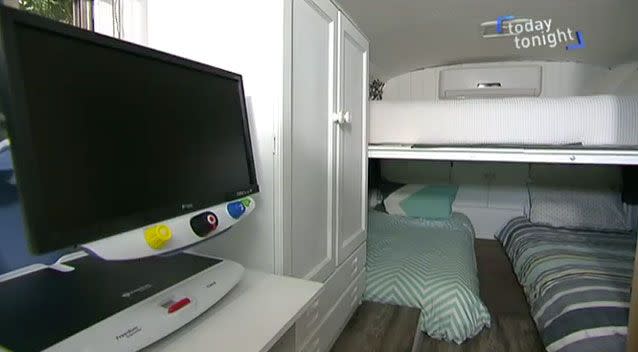 The bus has a full size fridge, washing machine, bedroom and living area. Photo: Today Tonight