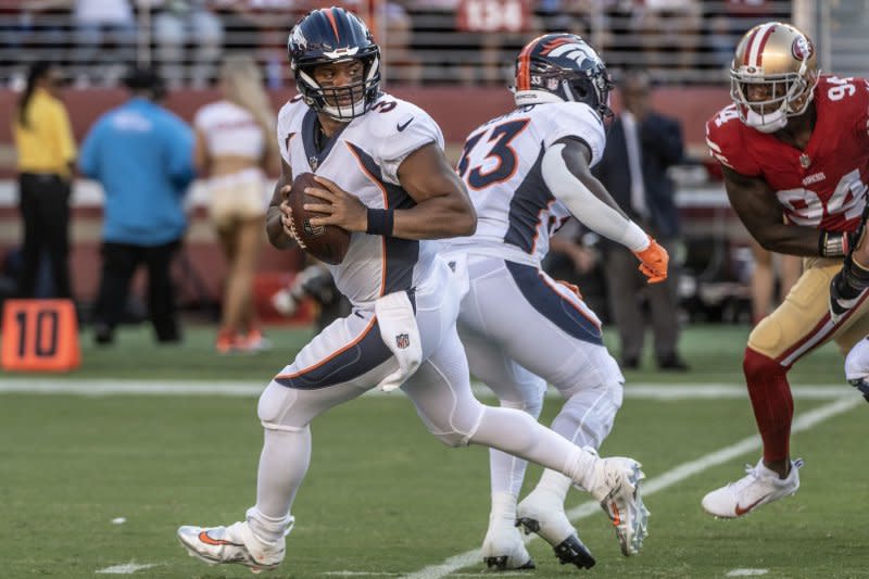 Denver Broncos veteran Russell Wilson (L) struggled last season, but could help your fantasy football team early on in 2023 if you choose to wait on drafting a quarterback. File Photo by Terry Schmitt/UPI