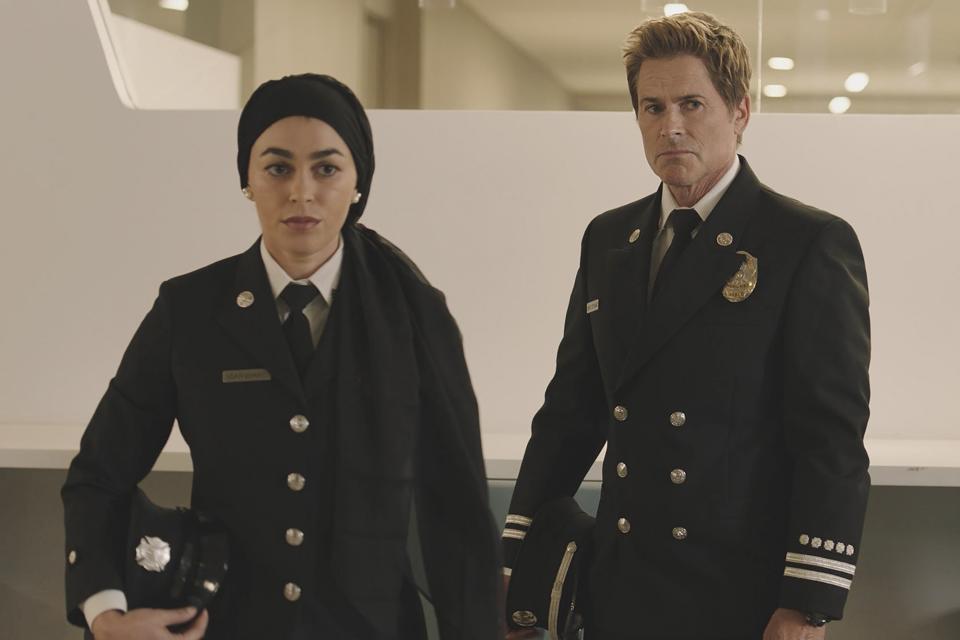 9-1-1 LONE STAR: L-R: Natacha Karam and Rob Lowe in the "Human Resources" episode of 9-1-1 LONE STAR airing Tuesday, Feb 21 (8:00-9:01 PM ET/PT) on FOX. © 2023 Fox Media LLC. CR: Kevin Estrada/FOX.