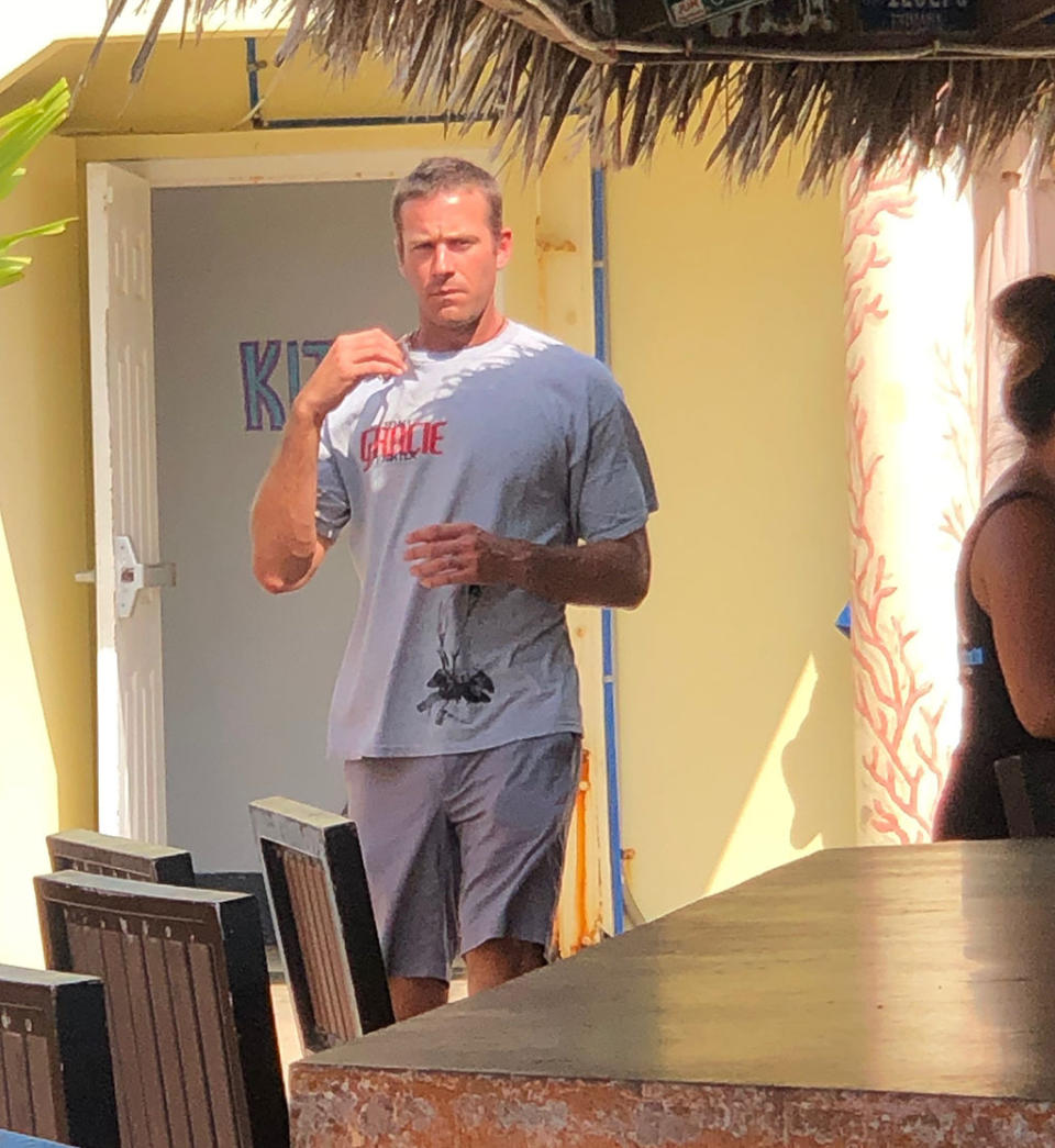 EXCLUSIVE: Armie Hammer is spotted at a restaurant in the Cayman Islands for the first time since allegations of sexual assault and cannibalistic fantasies we re made against him earlier this year. The actor  has changed his look considerably since we saw him last, having gotten a short crewcut and seemingly put on a few pounds. Spotted with two older people at lunch, along 3 other females â€“ all appeared to be nothing more than friends. According to an eyewitness who was also eating at the Macaboca, 