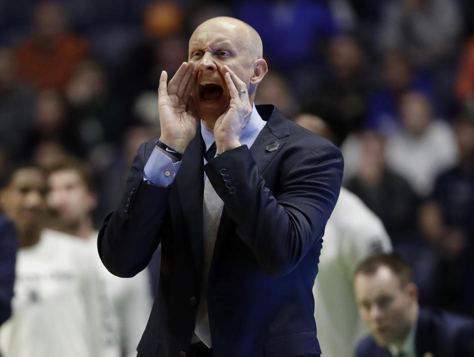 Xavier head coach Chris Mack screams to his team, during the second half of a second-round game against Florida State, in the NCAA college basketball tournament in Nashville, Tenn., Sunday, March 18, 2018. (AP)