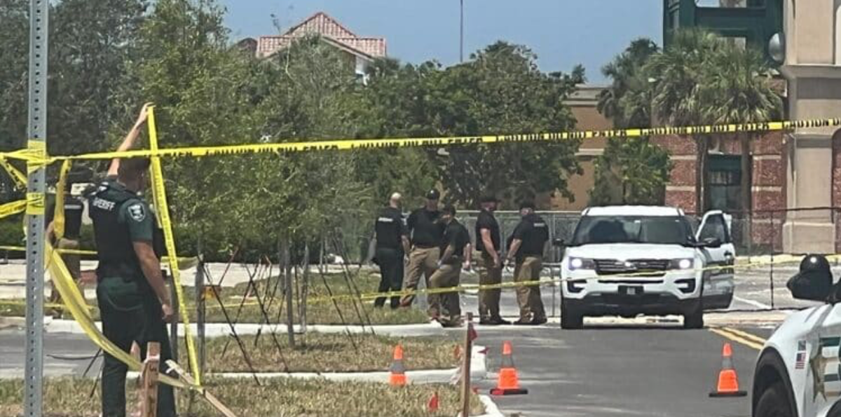 Police on the scene of a shooting in Gulf Coast Town Center, Florida, on Wednesday morning (NBC2)