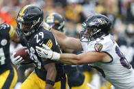 Pittsburgh Steelers defensive back Kam Kelly (29) tries to get away from Baltimore Ravens tight end Mark Andrews (89) after he made an interception in the first half of an NFL football game, Sunday, Oct. 6, 2019, in Pittsburgh. (AP Photo/Don Wright)