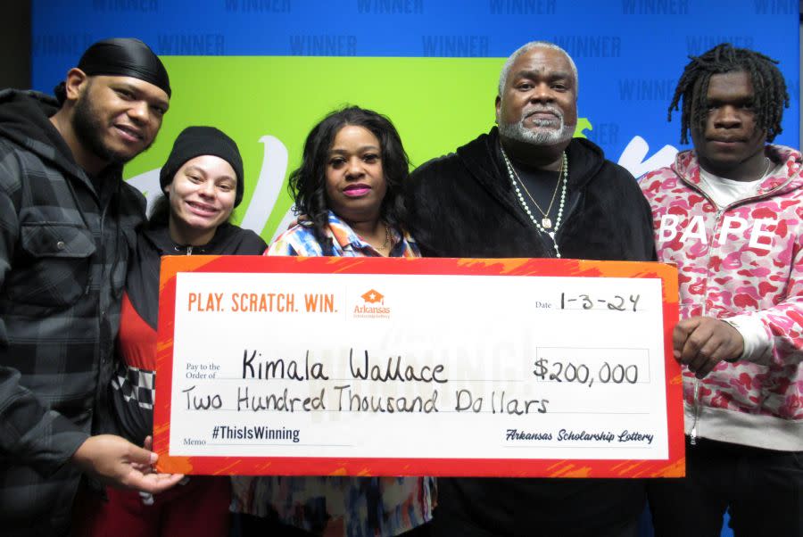 Arkansas Scholarship Lottery winner Kimala Wallace and her prize, Jan. 3, 2024. (courtesy ASL)