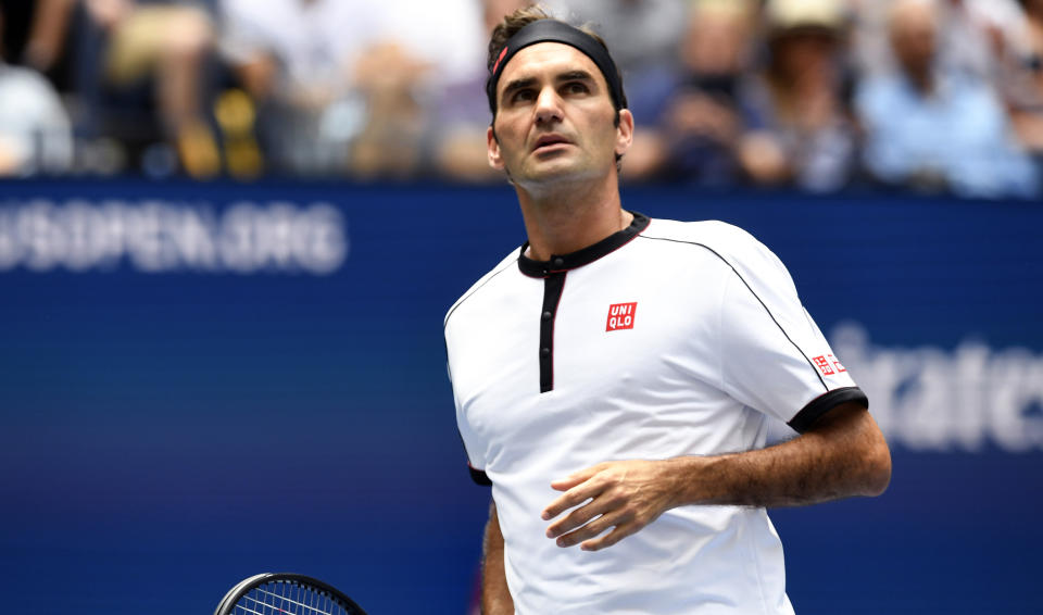 Roger Federer, of Switzerland, walks on the court to face David Goffin, of Belgium, during the fourth round of the US Open tennis championships Sunday, Sept. 1, 2019, in New York. (AP Photo/Sarah Stier)