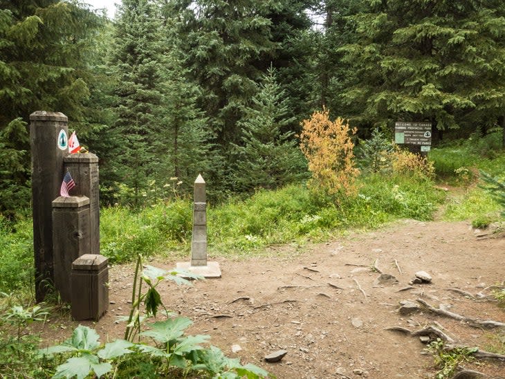<span class="article__caption">Monument 78 and the Canada/U.S. border marks the northern end of the Pacific Crest Trail</span> (Photo: eppicphotography/Getty)