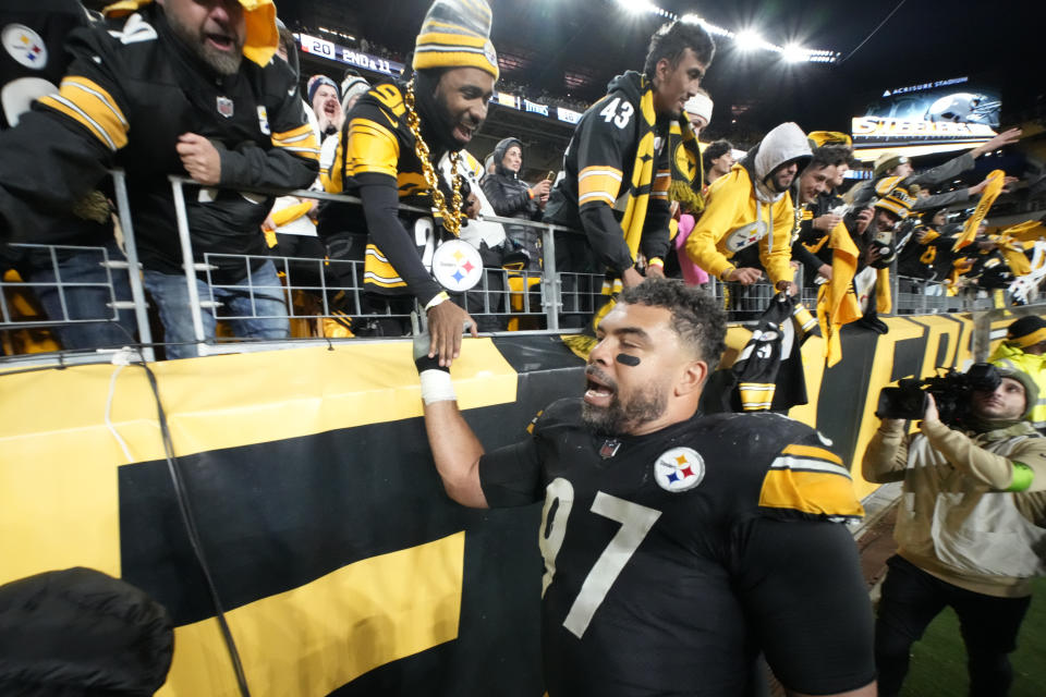 Pittsburgh Steelers defensive tackle Cameron Heyward celebrates the team's win against the Tennessee Titans with fans after an NFL football game Thursday, Nov. 2, 2023, in Pittsburgh. (AP Photo/Gene J. Puskar)