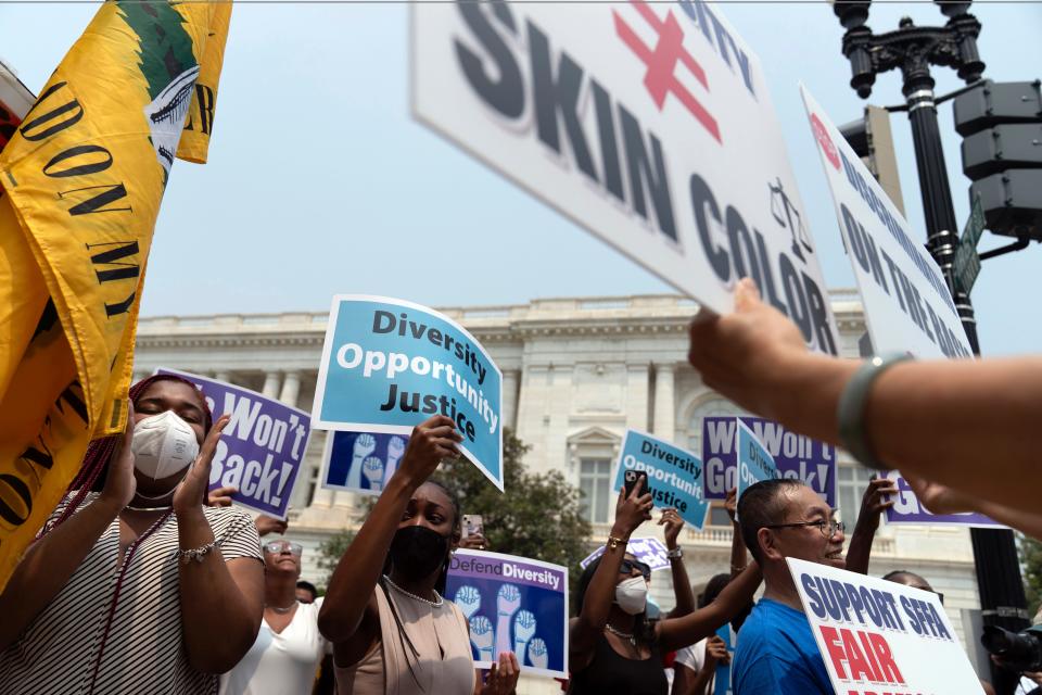 People protest an affirmative action ruling outside of the Supreme Court on June 29, 2023.
