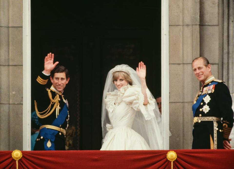 <div class="inline-image__caption"><p>Prince Charles, Princess Diana, and Prince Philip wave from the balcony of Buckingham Palace after Charles and Diana’s wedding on July 29, 1981. </p></div> <div class="inline-image__credit">Tim Graham/Getty</div>