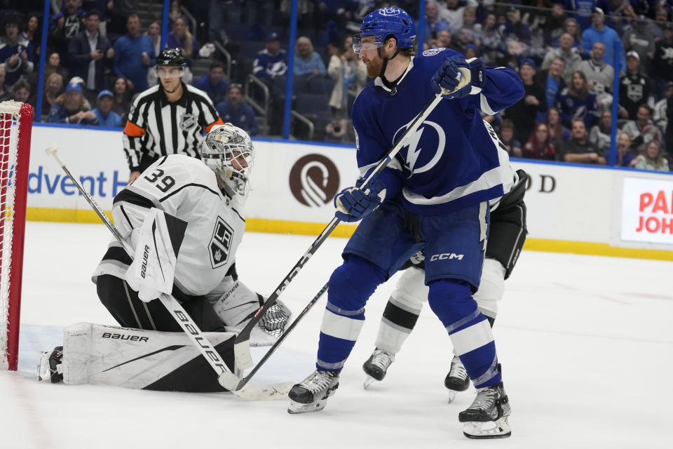 Tampa Bay Lightning defenseman Nick Perbix (48) catches his shot get past Los Angeles Kings goaltender Cam Talbot (39) for a goal during overtime in an NHL hockey game Tuesday, Jan. 9, 2024, in Tampa, Fla. (AP Photo/Chris O'Meara)
