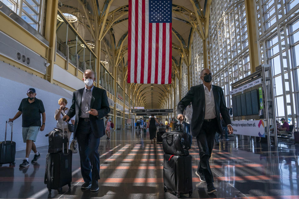 Travelers at the Ronald Reagan Washington National Airport
