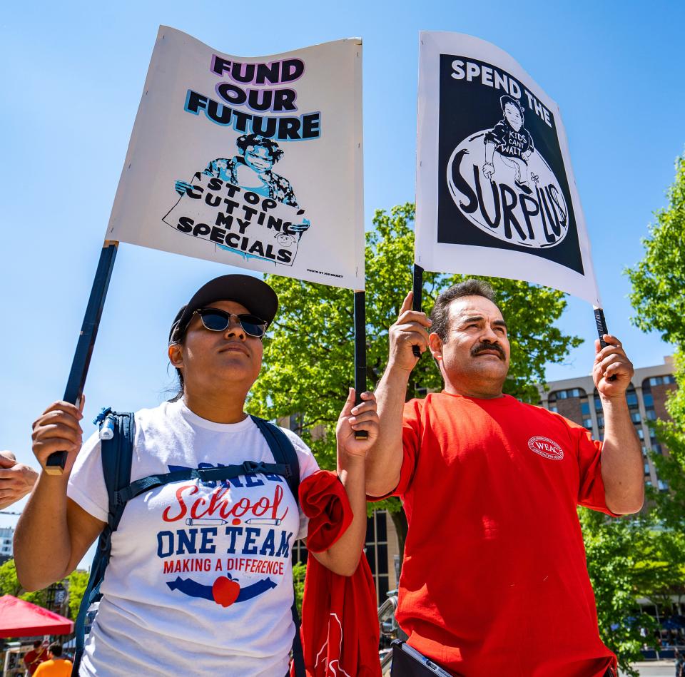 Yesenia Villanueva, 2nd grade teacher at Lincoln Avenue School in Milwaukee, along with her father Jose Villanueva attend the Wisconsin Education Association Council's rally to support Governor Evers’ Education Budget on Saturday May 20, 2023 at the Wisconsin State Capitol in Madison, Wis.