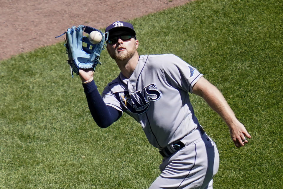 Tampa Bay Rays' Austin Meadows catches a deep fly ball from Chicago White Sox's Zack Collins during the sixth inning of a baseball game Wednesday, June 16, 2021, in Chicago. (AP Photo/Charles Rex Arbogast)